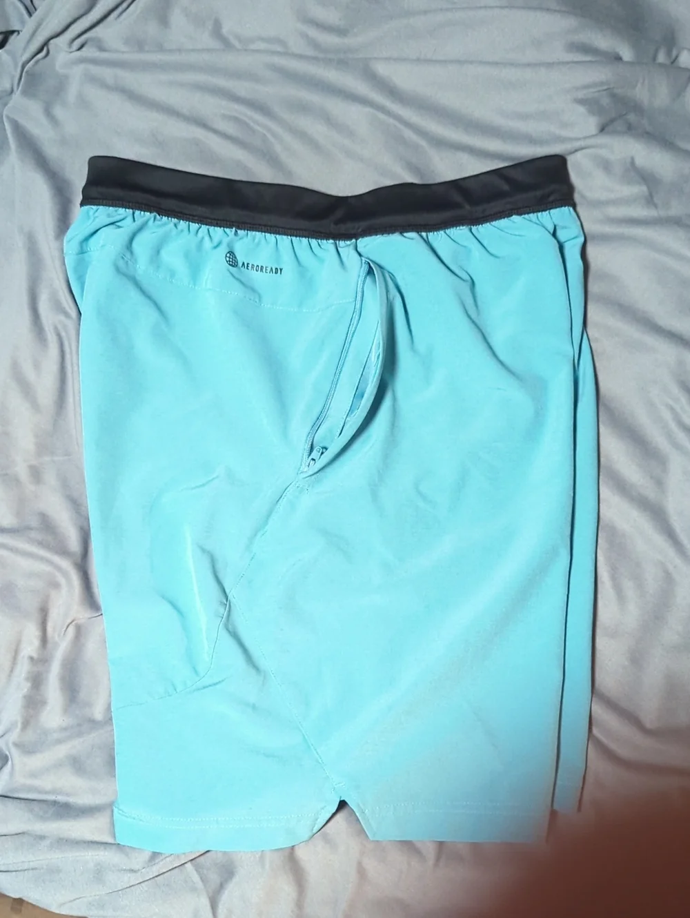 Adidas Men's Aeroready Axis Woven Training Shorts in a light blue colorway.